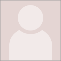 A small white oval over a larger white oval, meant to represent a person.